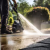 man-uses-power-washer-thoroughly-clean-driveway-removing-dirt-grime-effortlessly-man-using-electric-powered-pressure-washer-power-wash-residential-concrete-driveway-ai-generated_538213-16841